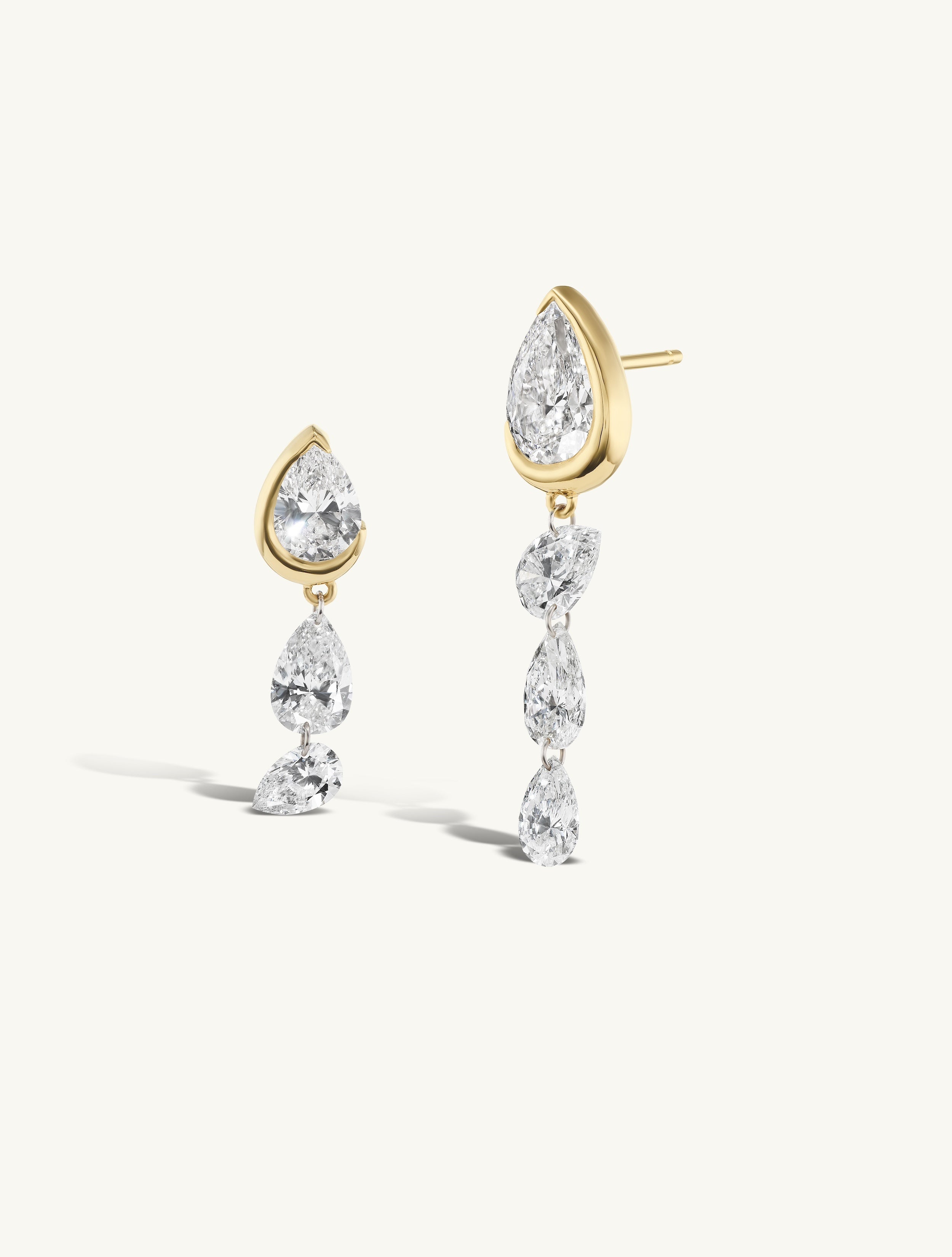Asymmetrical Droplet Studs with Dangling Pierced Diamond Pears
