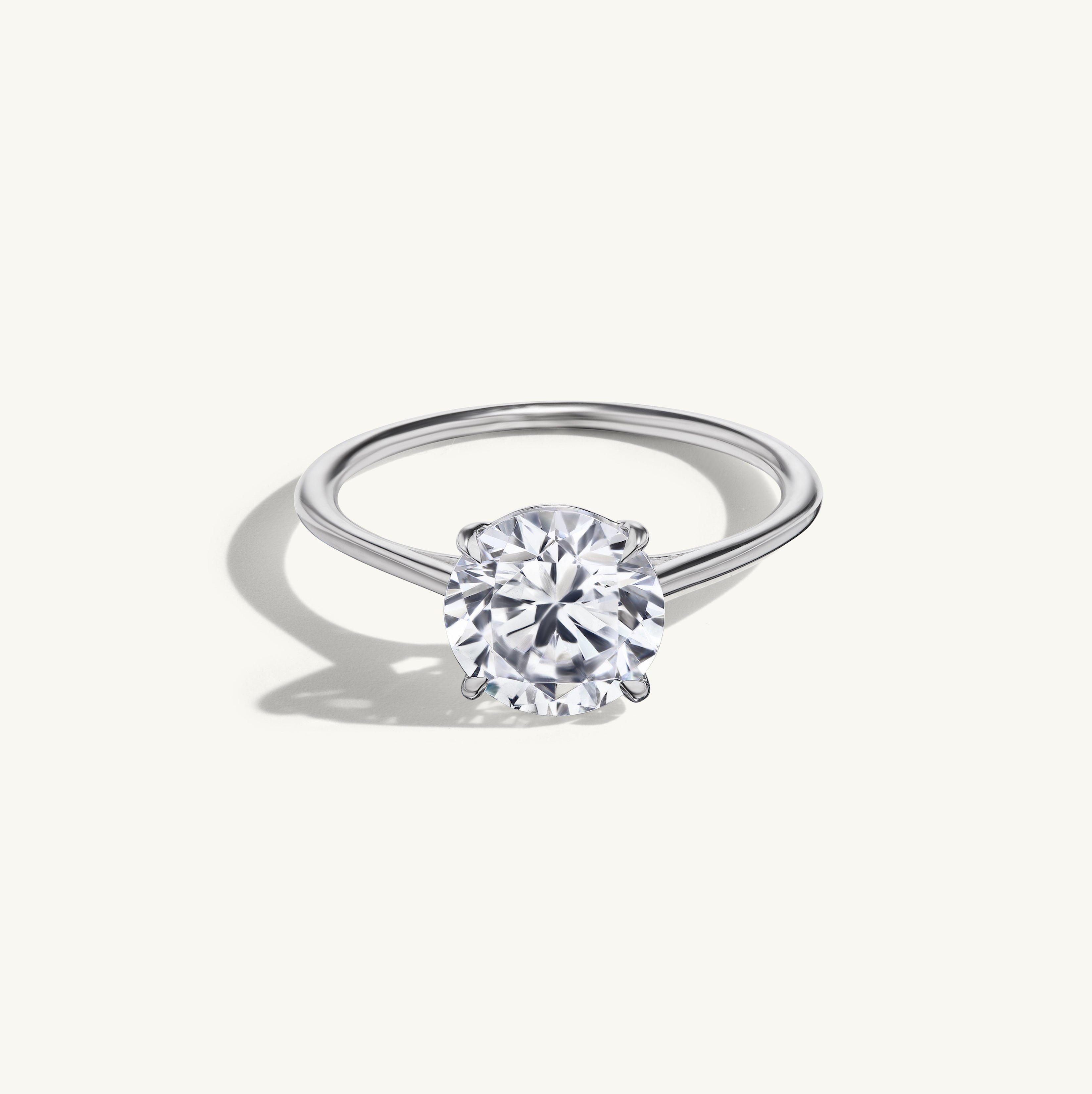 Floating Round Engagement Ring