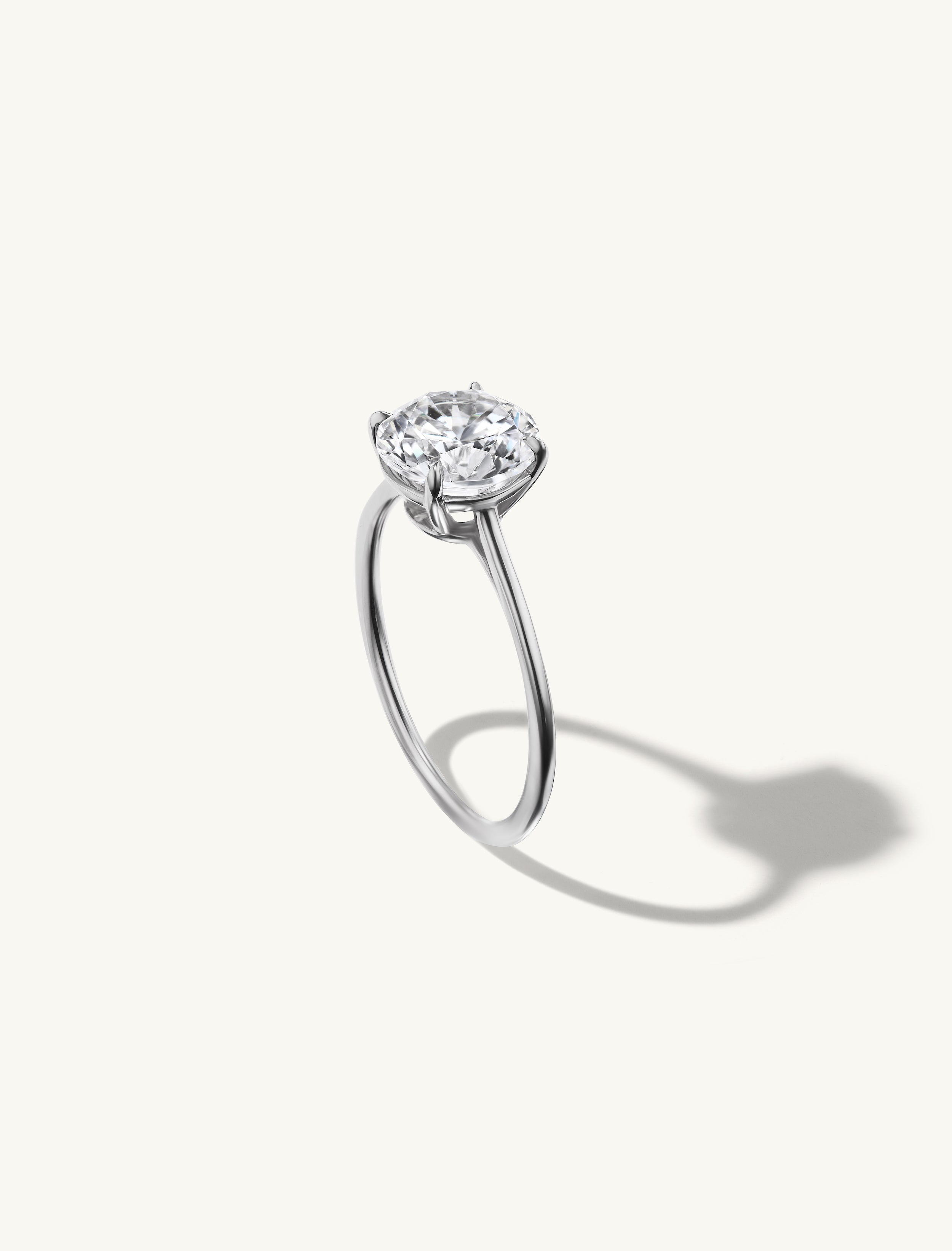 Floating Round Engagement Ring