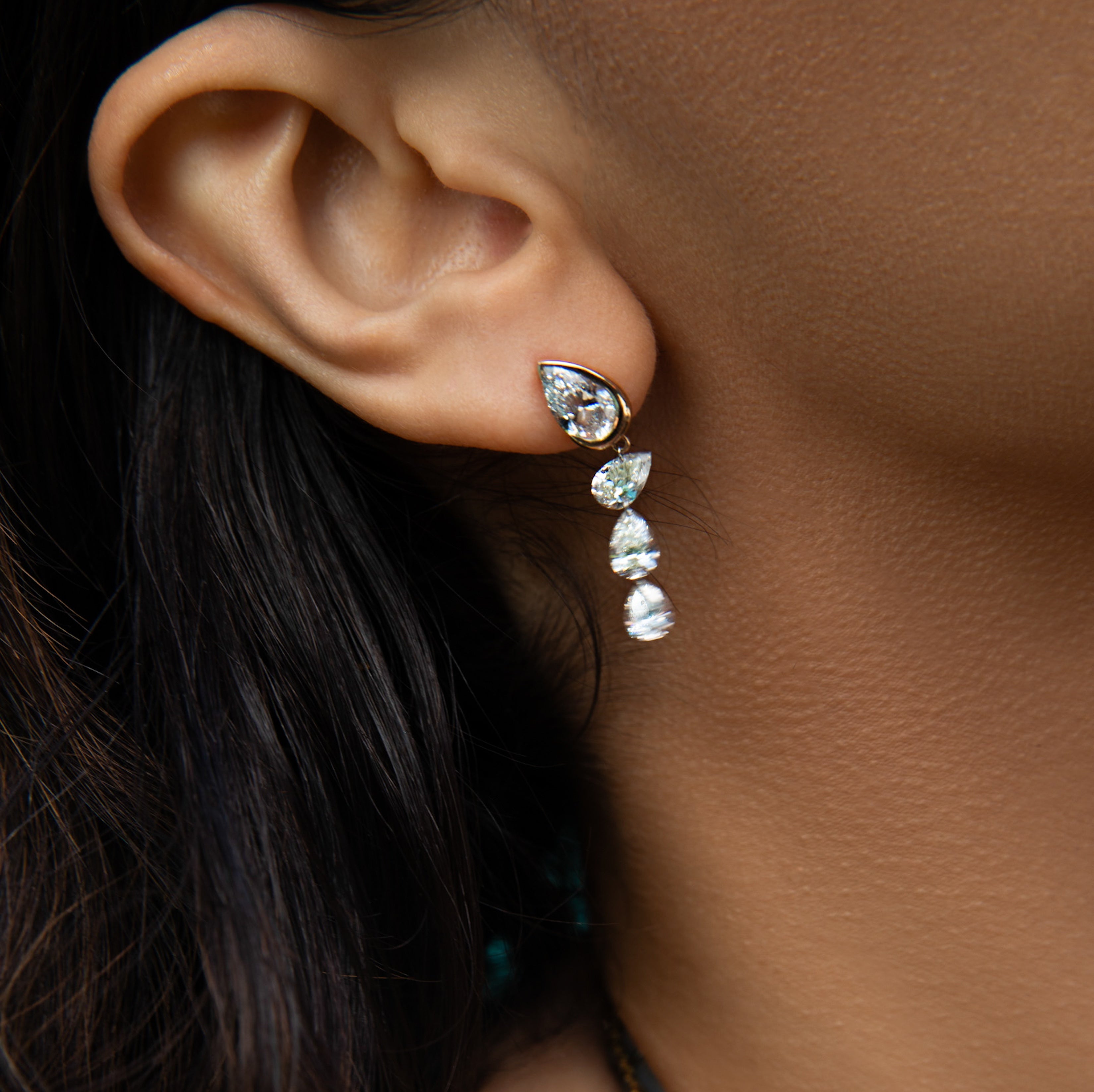 Asymmetrical Droplet Studs with Dangling Pierced Diamond Pears