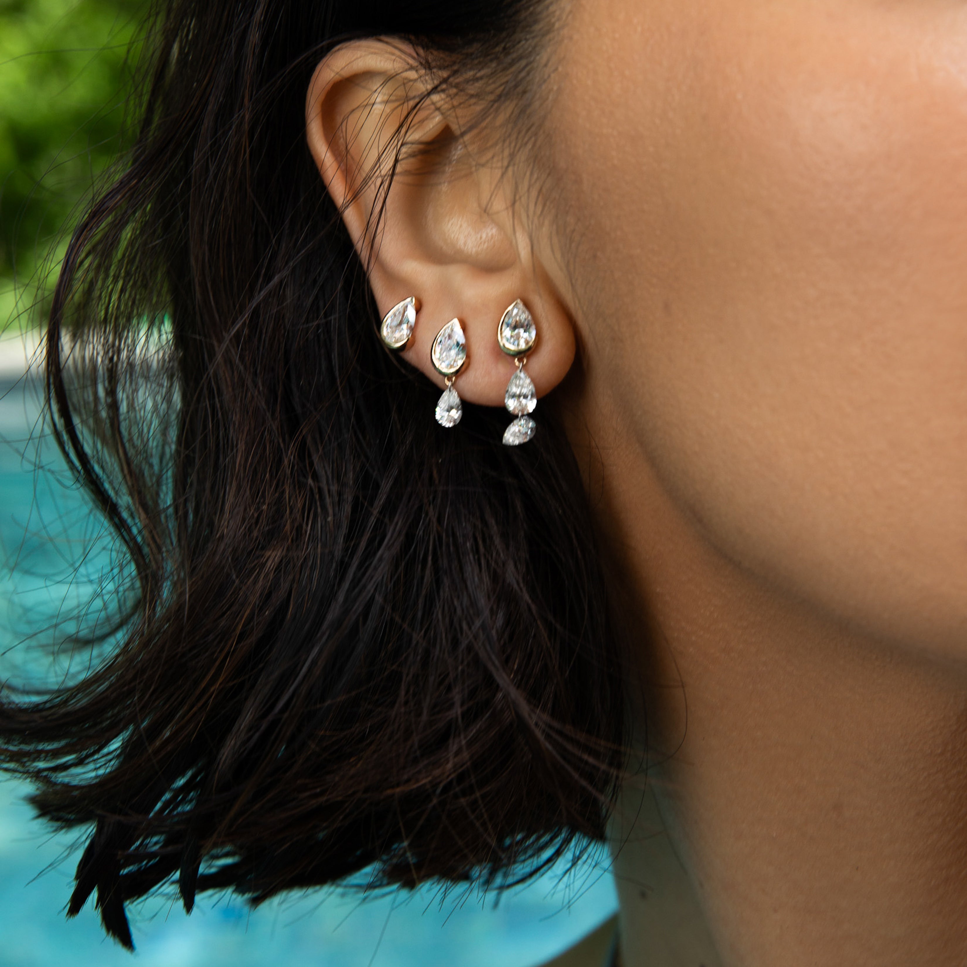 Asymmetrical Droplet Studs with Dangling Pierced Diamond Pears