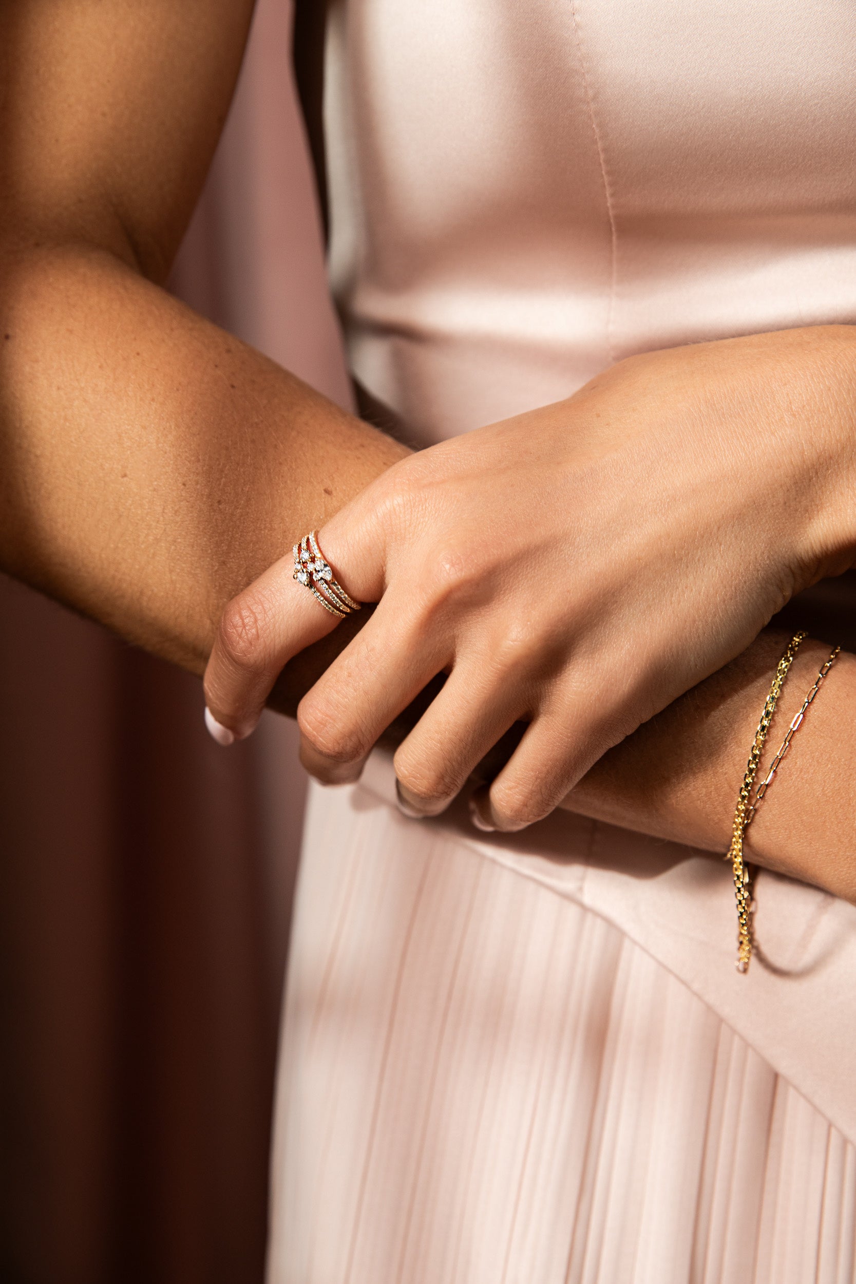 A model wears fine jewelry from the $750 & Under collection. Shop now and get 15% off sitewide through 12/01.