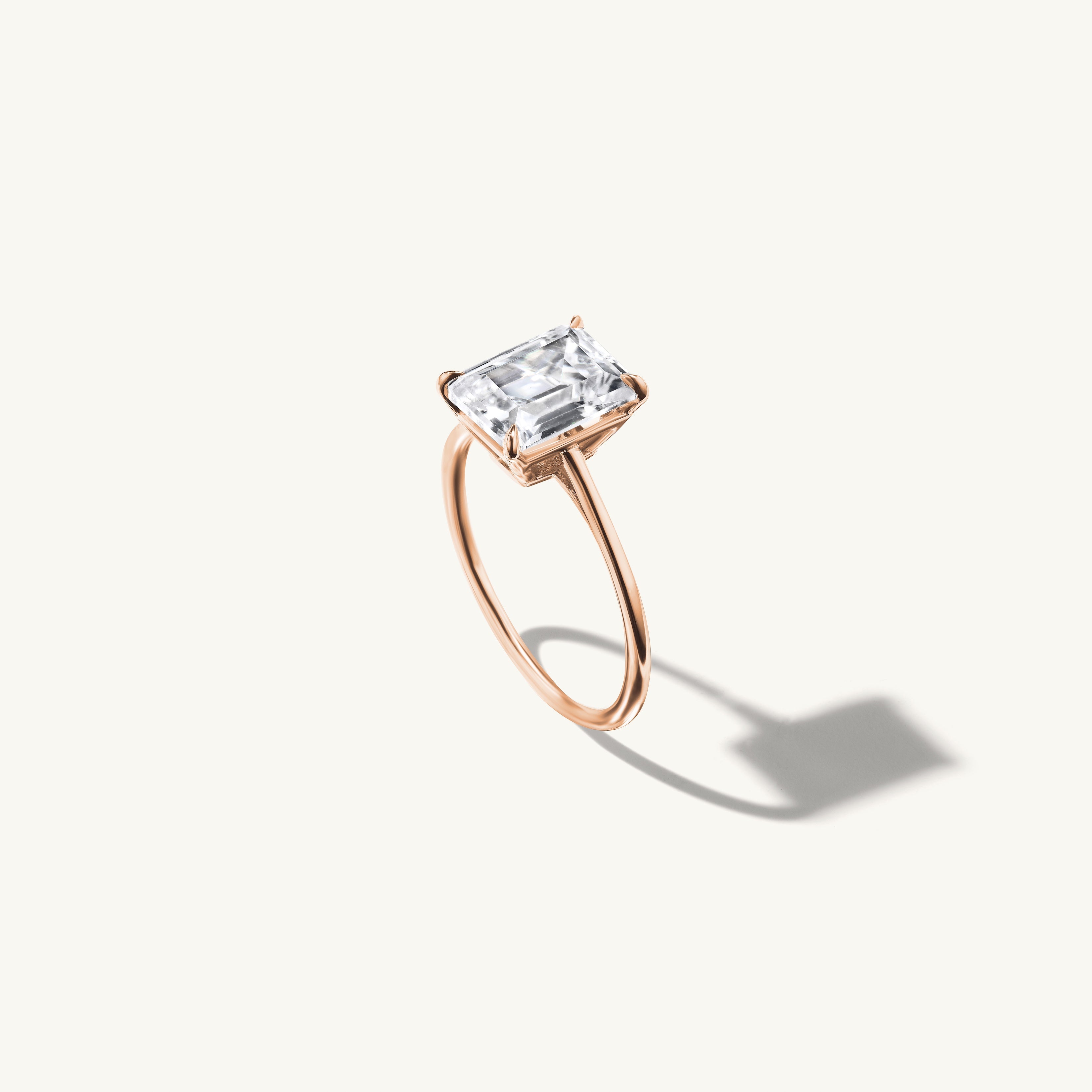 Floating Emerald Engagement Ring