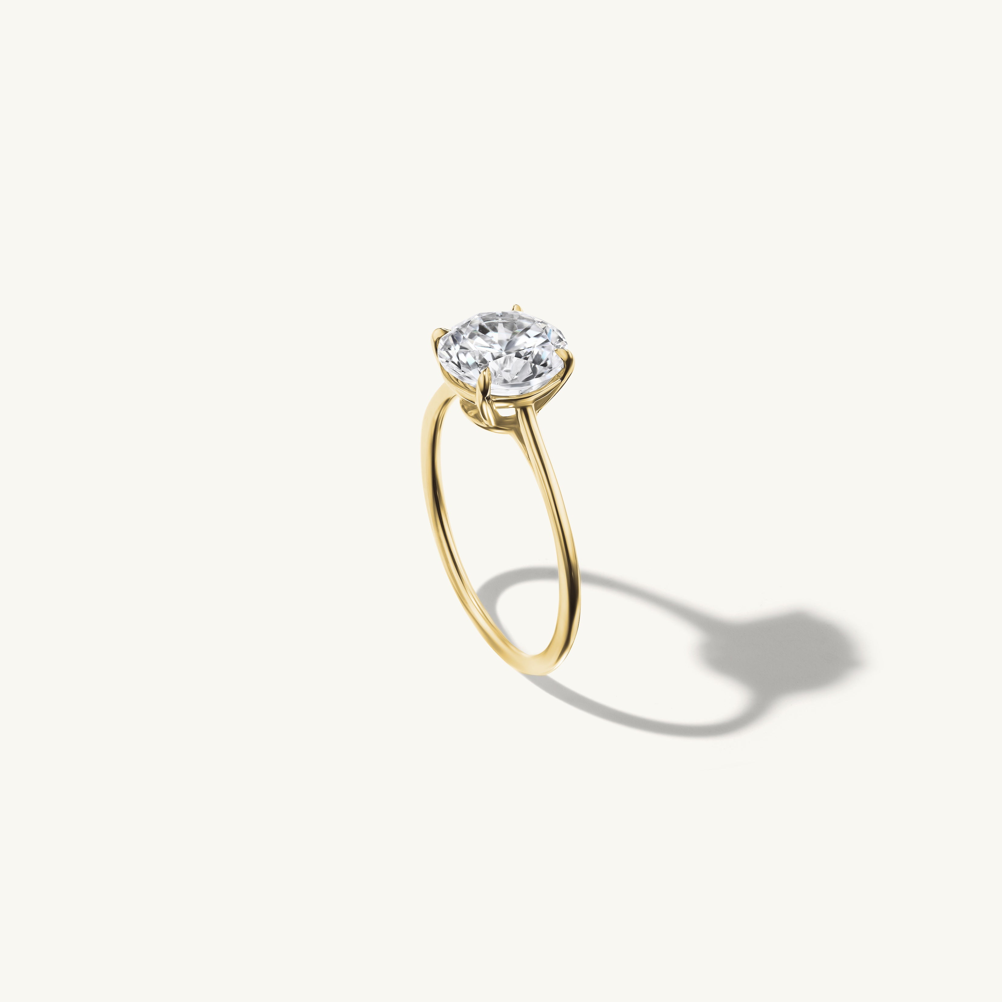 Floating Round Engagement Ring