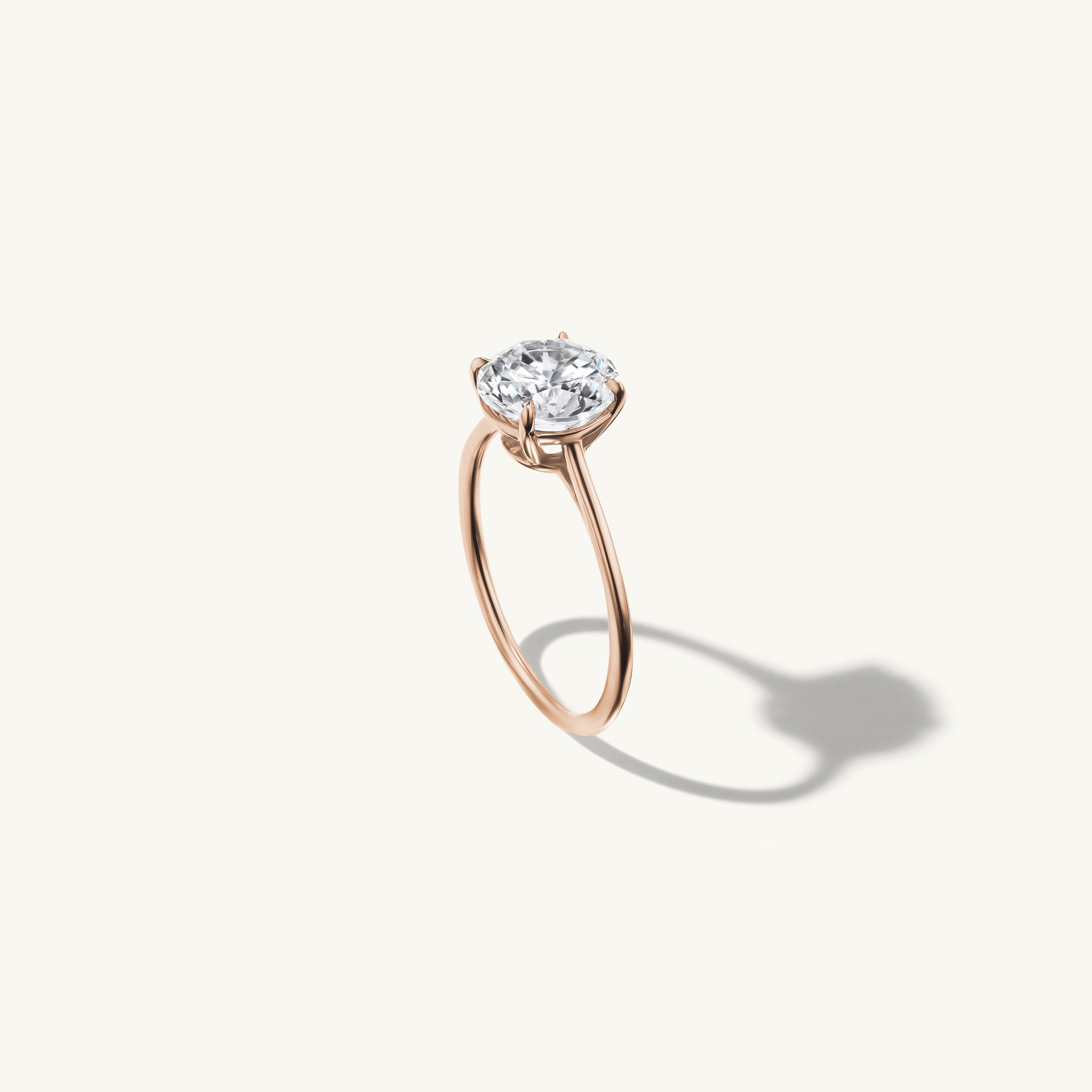 Floating Round Engagement Ring