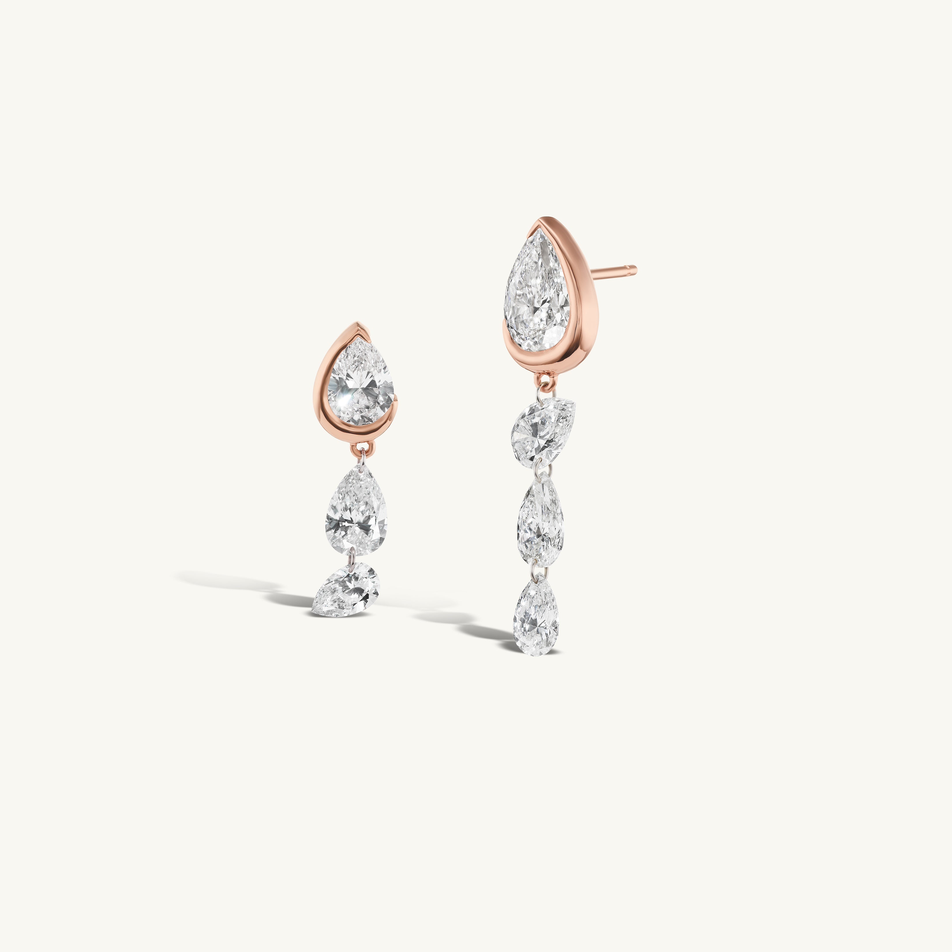 Asymmetrical Droplet Studs with Dangling Pierced Diamond Pears