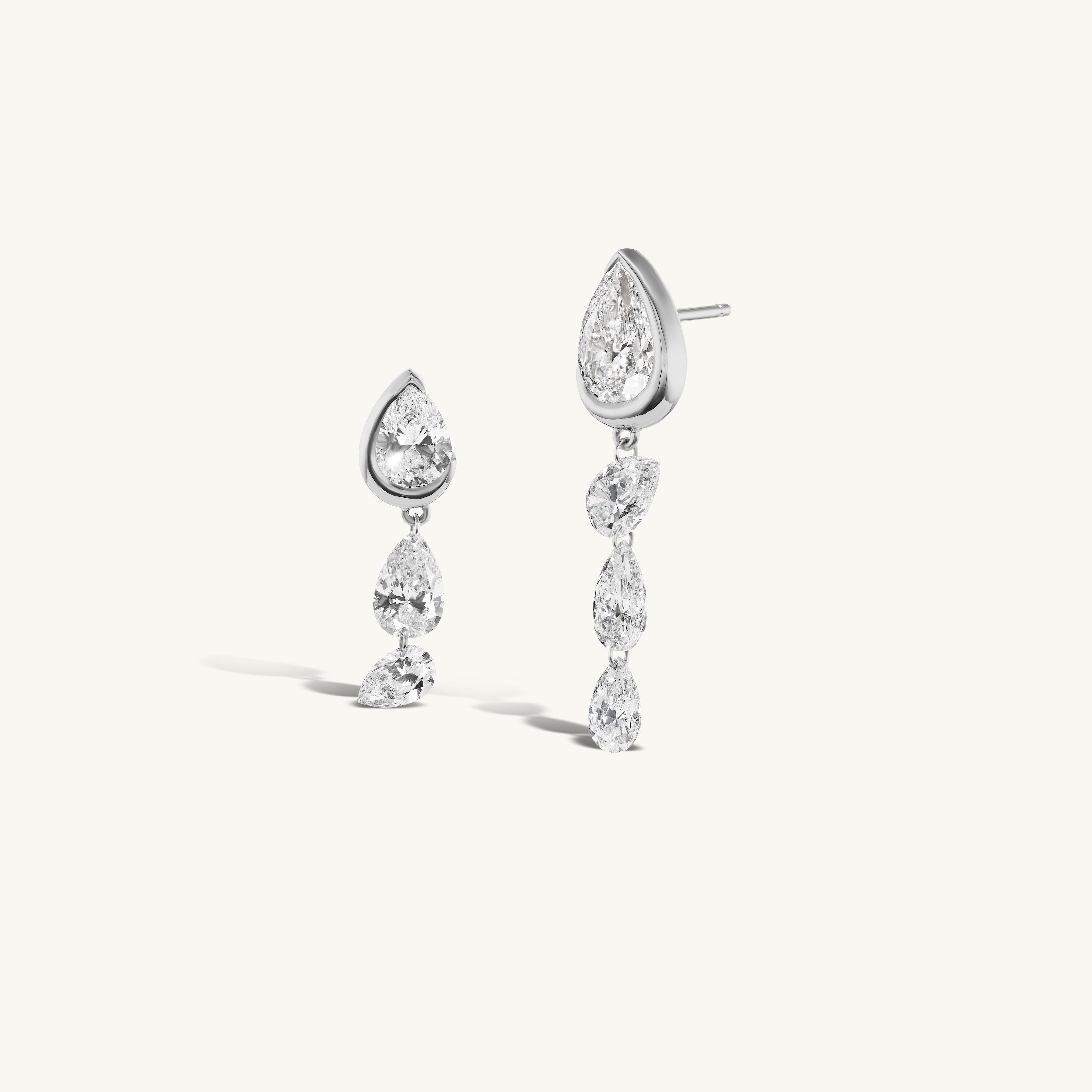 Asymmetrical Droplet Studs with Dangling Pierced Diamond Pears