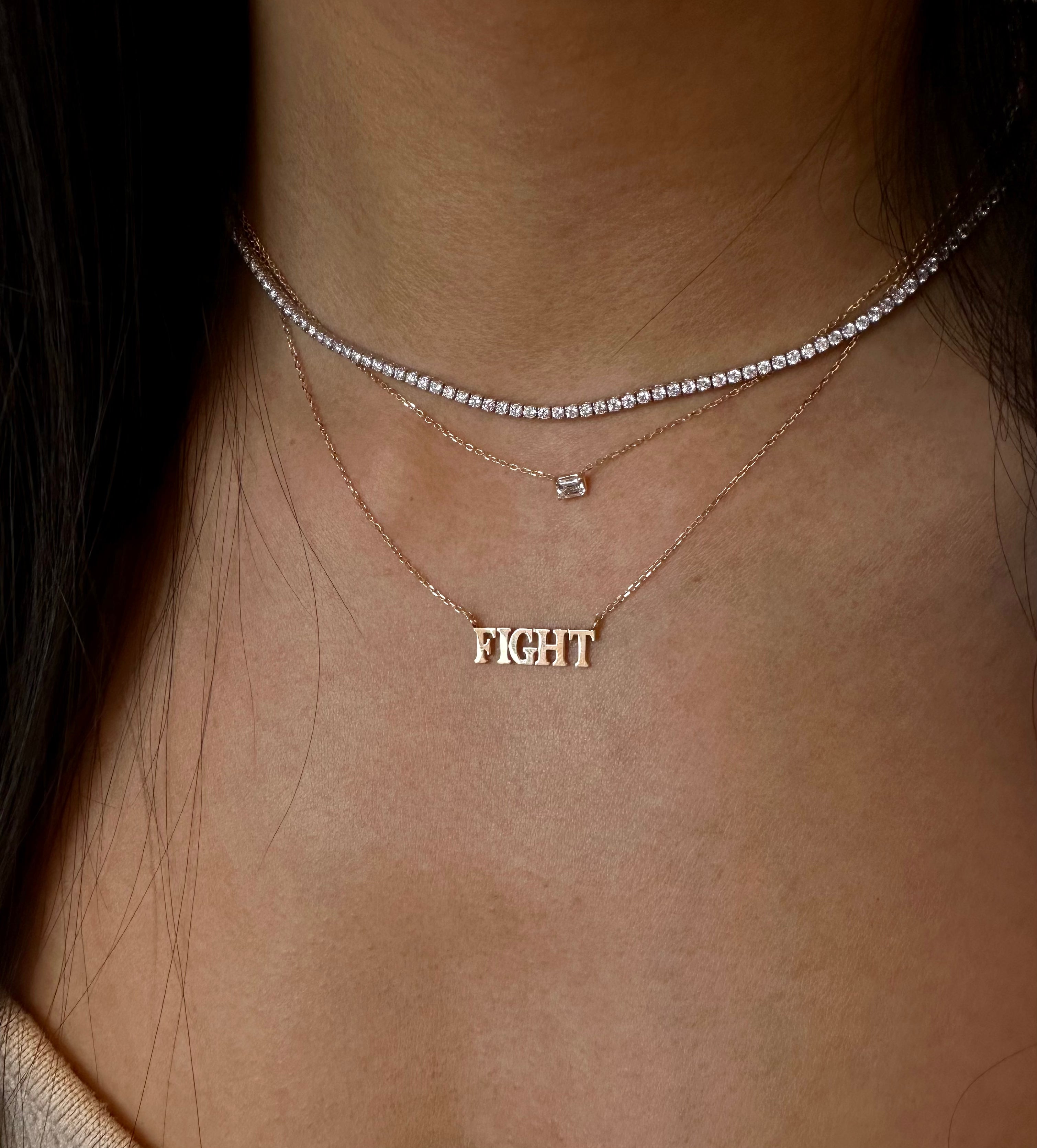 Fight script design on chain. Length: 16mm Width: 5mm  Chain Length: 16-18" available in sterling silver.