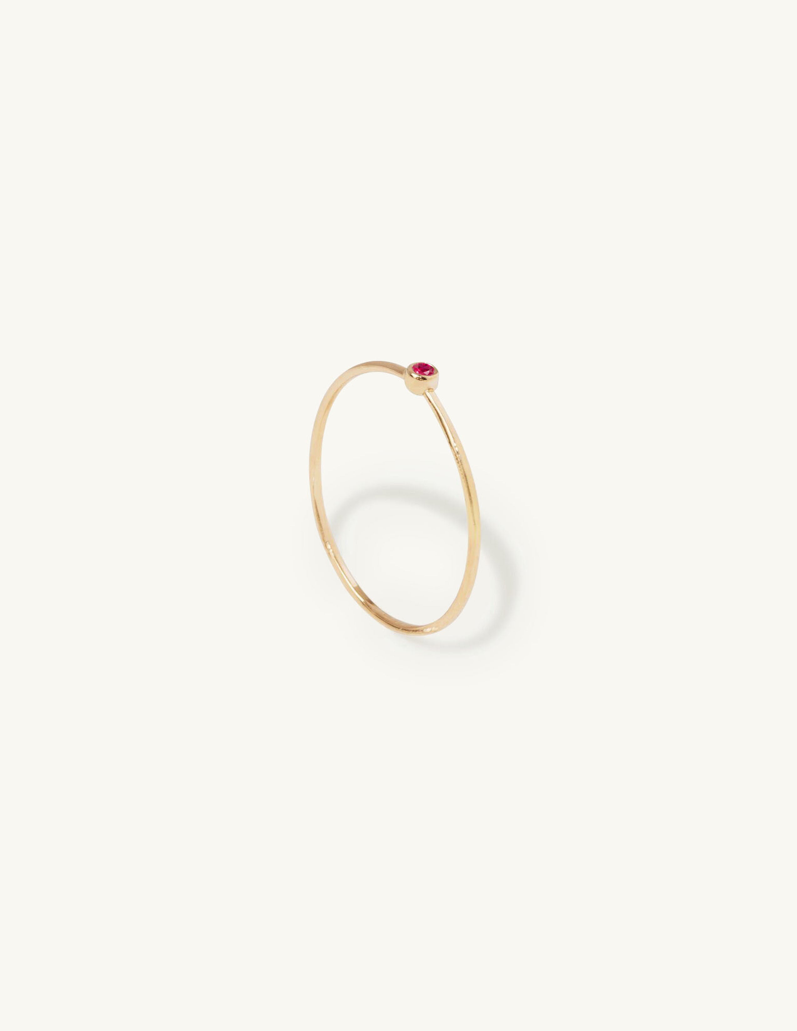 One Ruby Orbit Ring