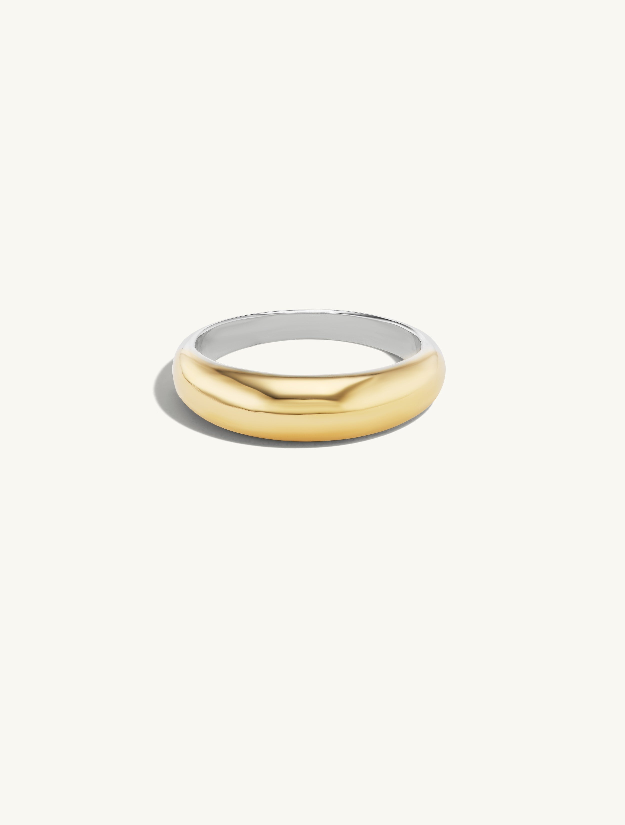 Thick Gold Tapered  Band. A Domed front of solid 14k gold with a sterling silver back. 