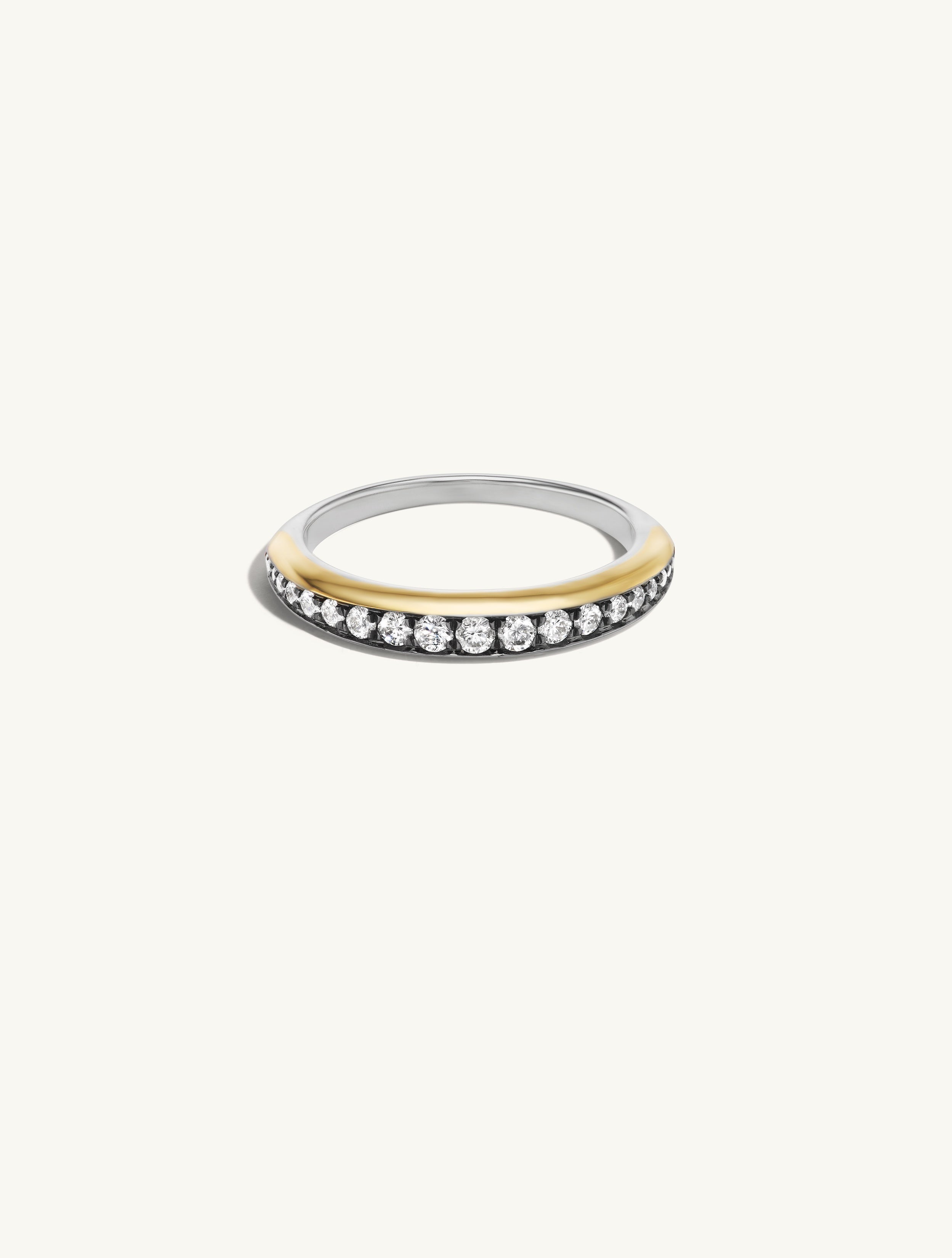 Fineman Sisters Thin Patina Diamond Band. A Domed front of solid 14k blackened gold an graduating lab grown diamonds, with a sterling silver back. 