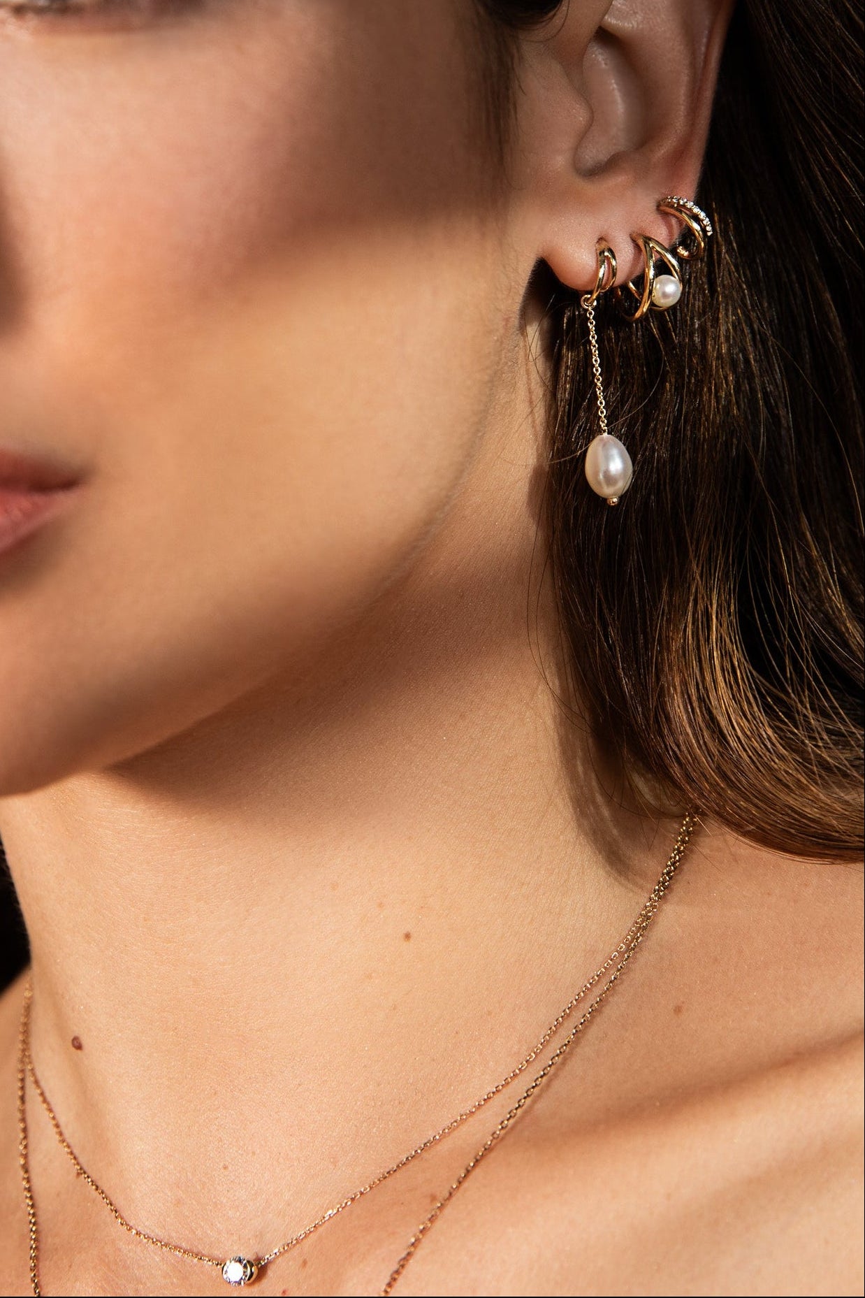 A model wears fine jewelry from the $750 & Under collection. Shop now and get 15% off sitewide through 12/01.