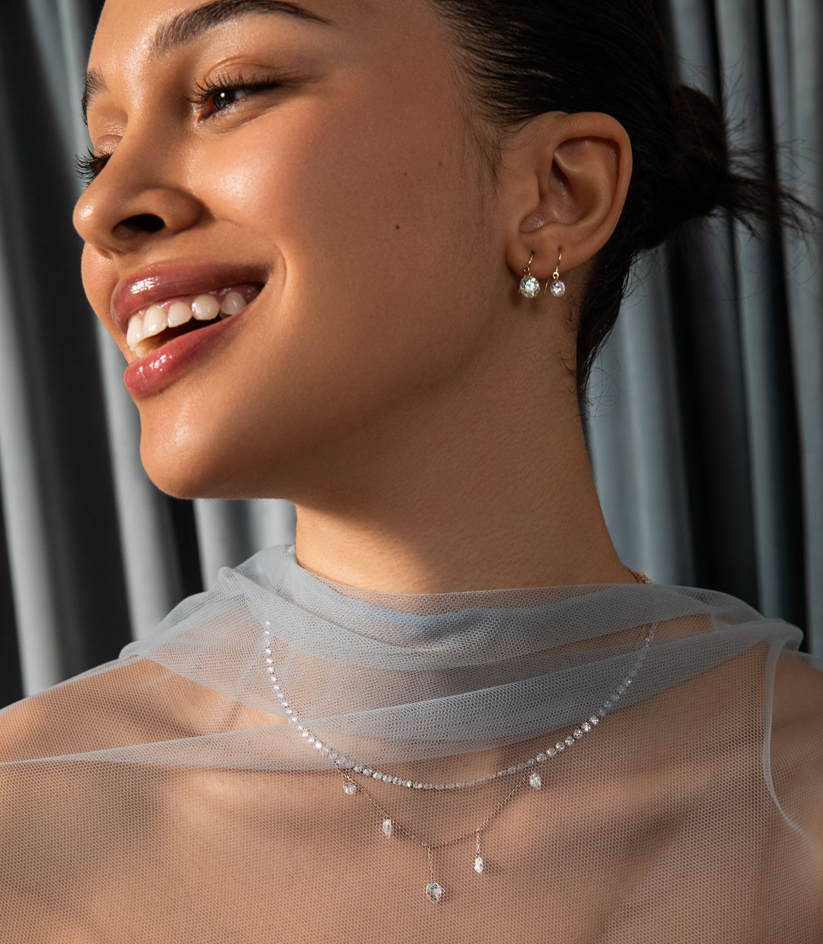 A models wears the sophie ratner pierced diamond collection. shop now and get 15% off sitewide through 12/01. 