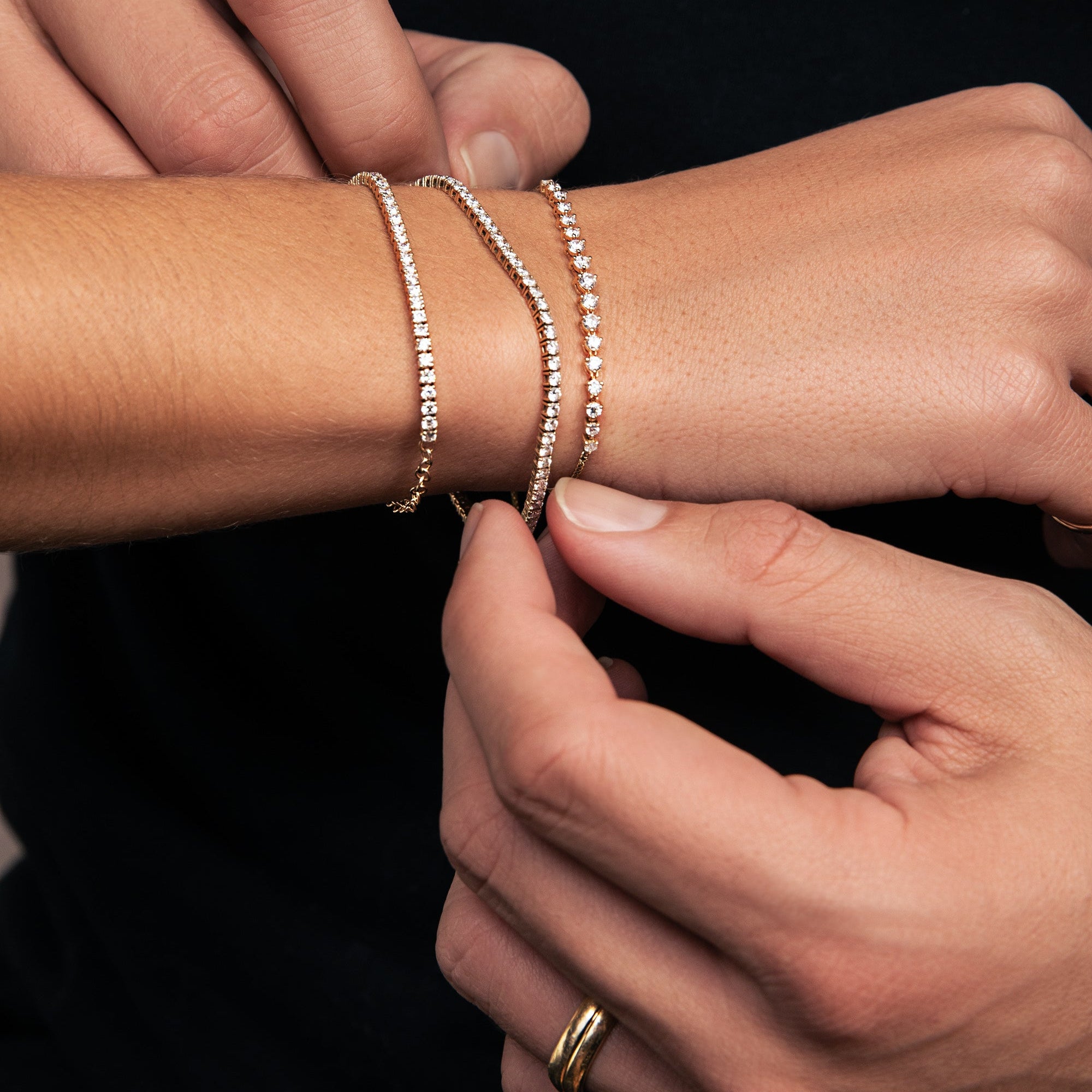 ella rose models tennis bracelets from her valentine's day edit, with her husband James. 
