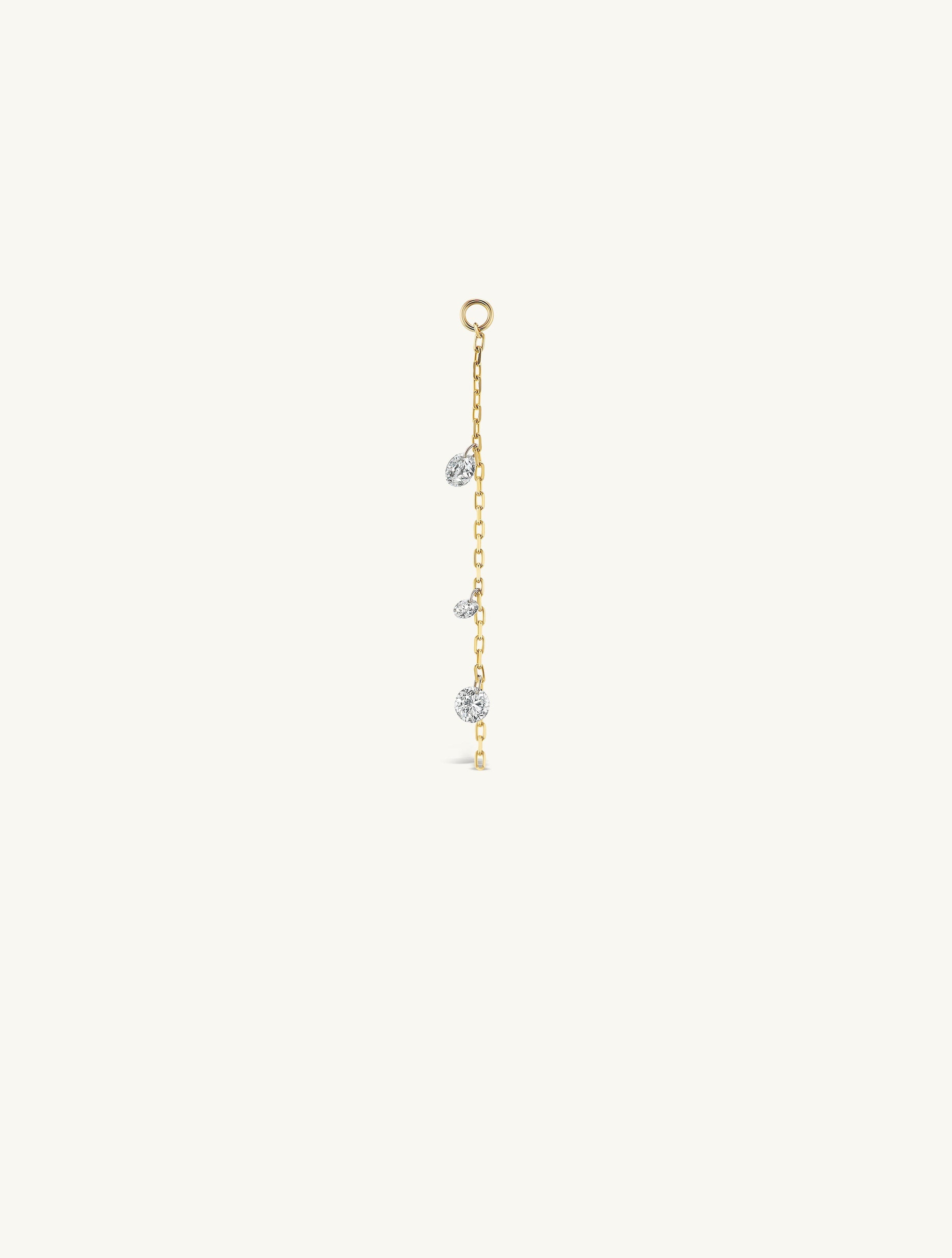 Gold necklace with small diamond pendants on a white background